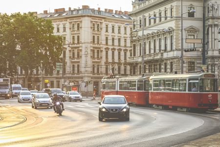 Vienna, Austria- May 28, 2018 : Old fashioned tram  passing Vienna downtown during the sunsetのeditorial素材