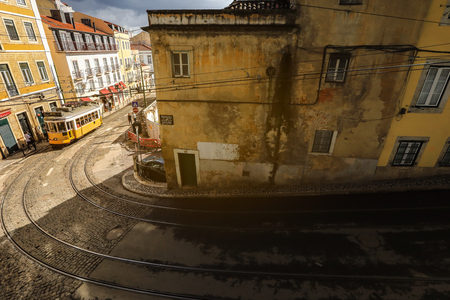LISBON - PORTUGAL, November 5, 2018: An old traditional tram carriage in the city centre of Lisbon, Portugal. The city kept old traditional tram in service within the historical part of the capitalのeditorial素材