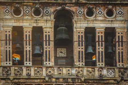 View of the Giralda the bell tower with blue sky, famous tourists attraction Seville Cathedral,...