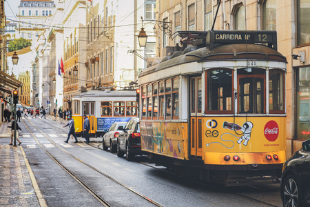 LISBON - PORTUGAL, November 5, 2018: An old traditional tram carriage in the city centre of Lisbon, Portugal. The city kept old traditional tram in service within the historical part of the capitalのeditorial素材