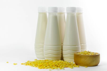 Home made of fresh Soy Milk (Soya) in plasstic bottles on white backgroundの写真素材