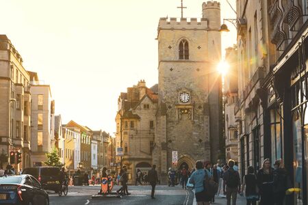 Oxford, United Kingdom - September 20 , 2019 : People walking around the Queen Street, Oxford near Carfax Tower. Queen Street is a pedestrianised shopping street in central Oxford, England.のeditorial素材