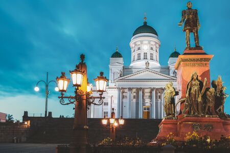Twilight at Helsinki Cathedral, Helsinki, Finland. The Facade Fronted By A Statue Of Emperor Alexander II Of Russiaの写真素材