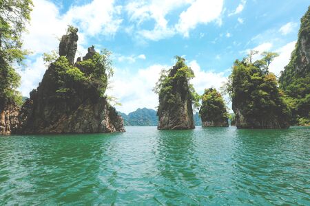 Selective focus on rock mountain and lake in Ratchaprapa dam, Khoa Sok National Park, Surat Thani, Thailand.の写真素材