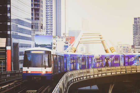 Bangkok, Thailand - February 20, 2020 :  BTS Sky Train is running in downtown of Bangkok.  Sky train...