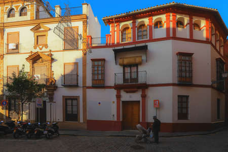 Seville, Spain - January 3, 2019: Street in old part of Seville town on summer day, Andalucia, Spain.のeditorial素材
