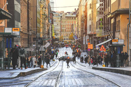 Helsinki, Finland - October 5, 2019 : Selective focus on people walking on the central part of the Helsinki city, Finlandのeditorial素材