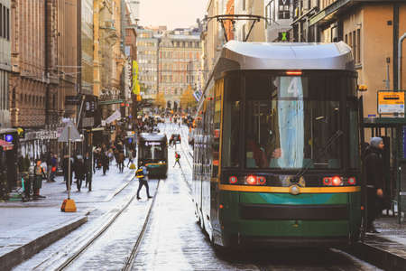 Helsinki, Finland - October 5, 2019 : green tram transporting people in the central part of the Helsinki city, Finlandのeditorial素材