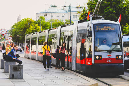 Vienna, Austria- May 27, 2018 : Passengers waiting for old fashioned tram in Vienna downtownのeditorial素材