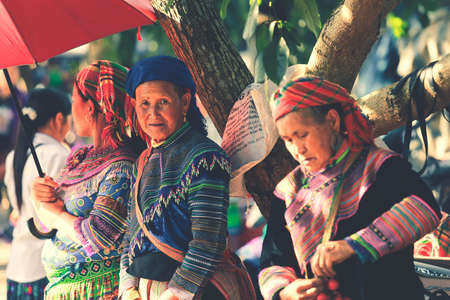 Bac ha, Vietnam - July 7, 2019 : Soft focus on hmong woman standing in Bac Ha market, Bac Ha is hill tribe market where people come to trade for goods in traditional costumesのeditorial素材