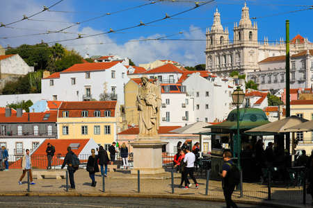Lisbon - Portugal, November 5, 2018 : Tourists visiting to Largo Portas do Sol street in historic Alfama districtのeditorial素材