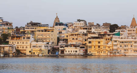 View of Udaipur city at lake Pichola in the morning, Rajasthan, India.の写真素材