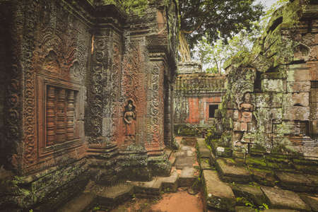 Carved wall bas-relief in Angkor Wat temple, Siem Reap, Cambodia. Ancient khmer architectureの写真素材