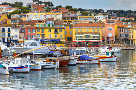 Marseille, France - April 7, 2019: View Of colorful Buildings and boats in the small village at Port-Cassis, Franceのeditorial素材