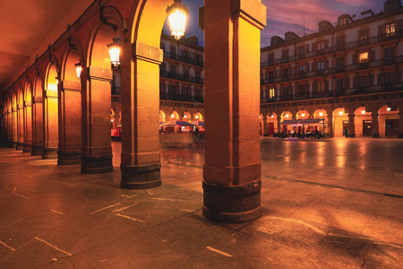 Spain San-Sebastian - June 5, 2021 : Selective focus on building and pavement. Constitution Square and the former town hall at twilight. The main square of the cultural capital of Europeのeditorial素材