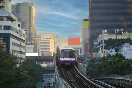 Bangkok Thailand- July 18, 2021: Selective focus on BTS Sky Train is running in downtown of Bangkok. Sky train is fastest transport mode in Bangkokの写真素材