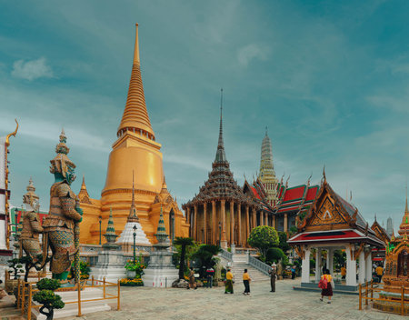 Bangkok, Thailand - Febuary 25, 2021: Wat Phra Kaew, Temple of the Emerald Buddha with blue sky...