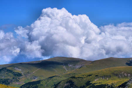 Cloudy sky over Transalpina road, Carpathians, Romania