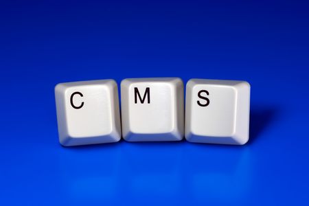 cms content management system written with keyboard keys on blue backgroundの写真素材