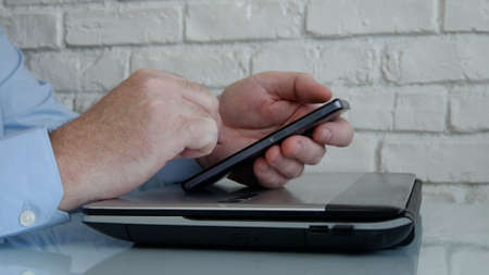 Businessman Working from Home Use Mobile and Internet Connection Accessing from Distance Company...
