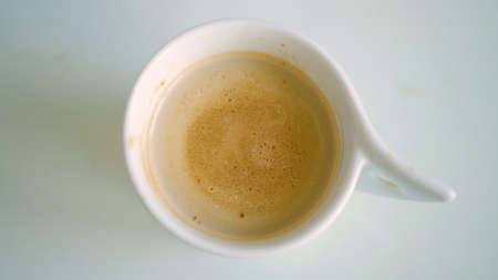 Image with a Cup with Flavored Coffee Mixed with Fresh Milkの写真素材