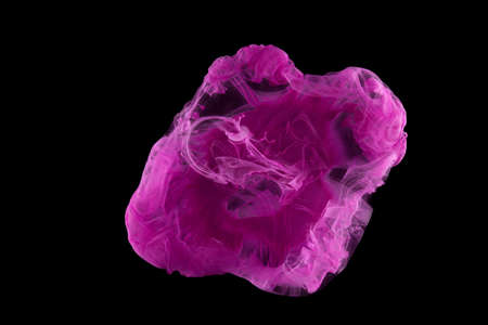 Abstract ink in water on a black backgroundの写真素材