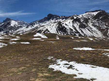 Andes mountain range landscape covered with snowの写真素材