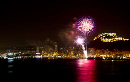 Fireworks during the night on the beach Alicante - Spain 