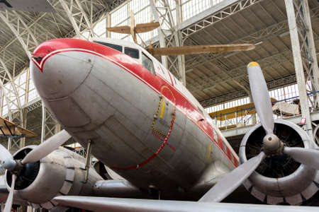 Vintage Commercial Airplane Inside A Hangarのeditorial素材