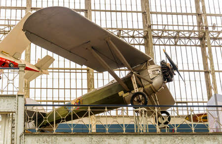 Vintage Airplane Inside A Hangar