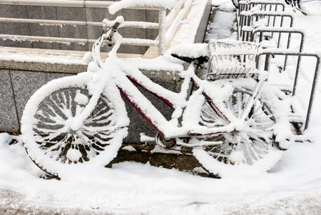 Bike fully covered with snow in winter seasonの写真素材