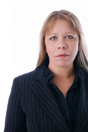 Attractive female executive, professional, or business woman in black pinstripe jacket over white.の写真素材