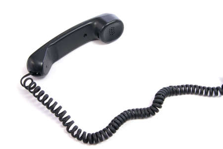 Telephone handset with cord isolated on whiteの写真素材