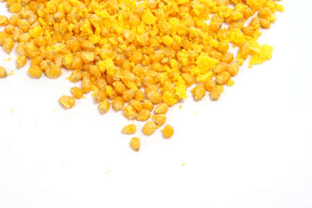 Uncooked popcorn on whiteの写真素材