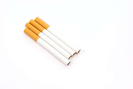 Cigarettes on white background. Good for smoking, health, danger concepts.の写真素材