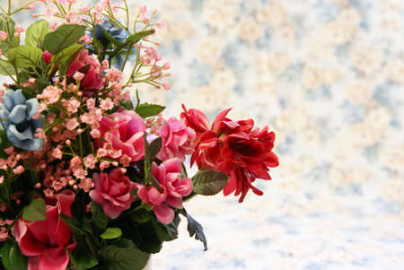 Silk flower home decor arrangement on soft spring toned backgroundの写真素材