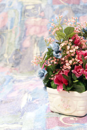 Silk flower home decor arrangement on soft spring toned backgroundの写真素材