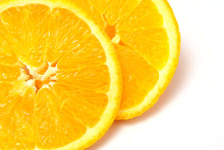 Orange slices close up on white background