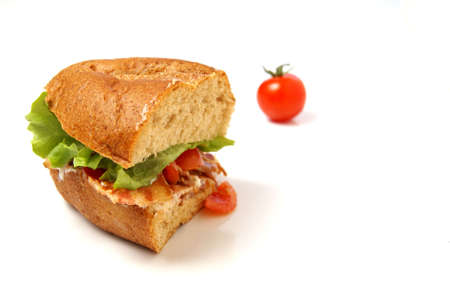 Bacon Sandwich with bacon, lettuce, tomato and mayo on whole wheat coarse bread bun