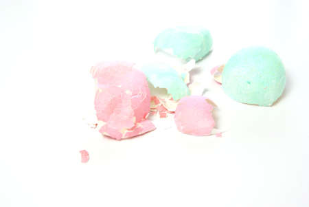 After Easter. Broken pieces of colorful pastel eggshells