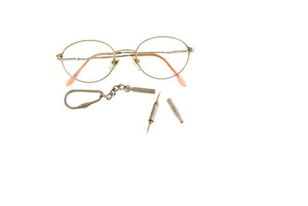 Eye Glasses and eyeglass repair kit on white backgroundの写真素材
