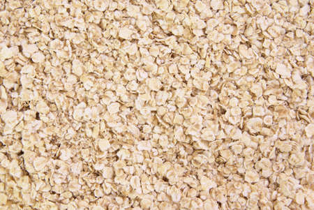 Raw rolled oats background, texture, or design elementの写真素材