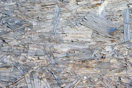 Grunge texture of old gray weathered peeling plywoodの写真素材