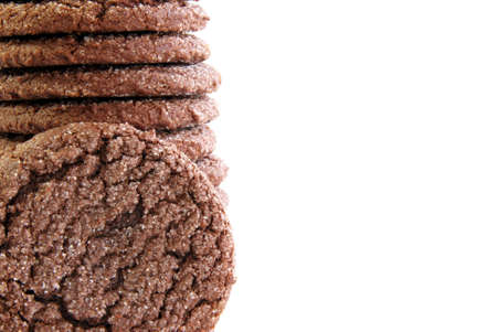 Chocolate cookie background or frame with white copyspaceの写真素材