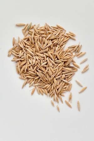 loose oats on a white background