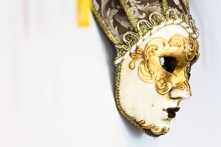 Traditional venetian carnival mask on wallの写真素材