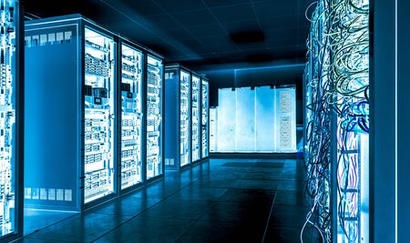 Big datacenter with connected servers and internet cable infrastucture. In blue bright tones