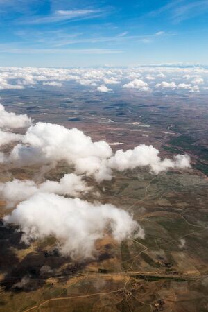 Aerial view from plane above clouds on Morocco west Africa