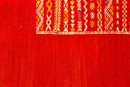 Handmade by berber woman colourful rugs in vibrant tones for sale in media soukeの写真素材