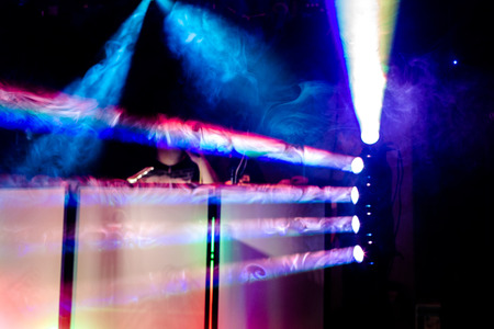 Disco party colourful spotlights and smoke at DJ station. Horizontal full frame cropの写真素材